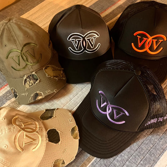 v)(v trucker hat